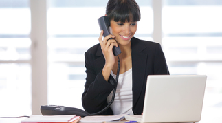 Female secretary answering the phone - Insurance Agency Customer Service